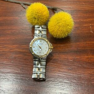 This lovely Raymond Weil wristwatch is calling your name :)